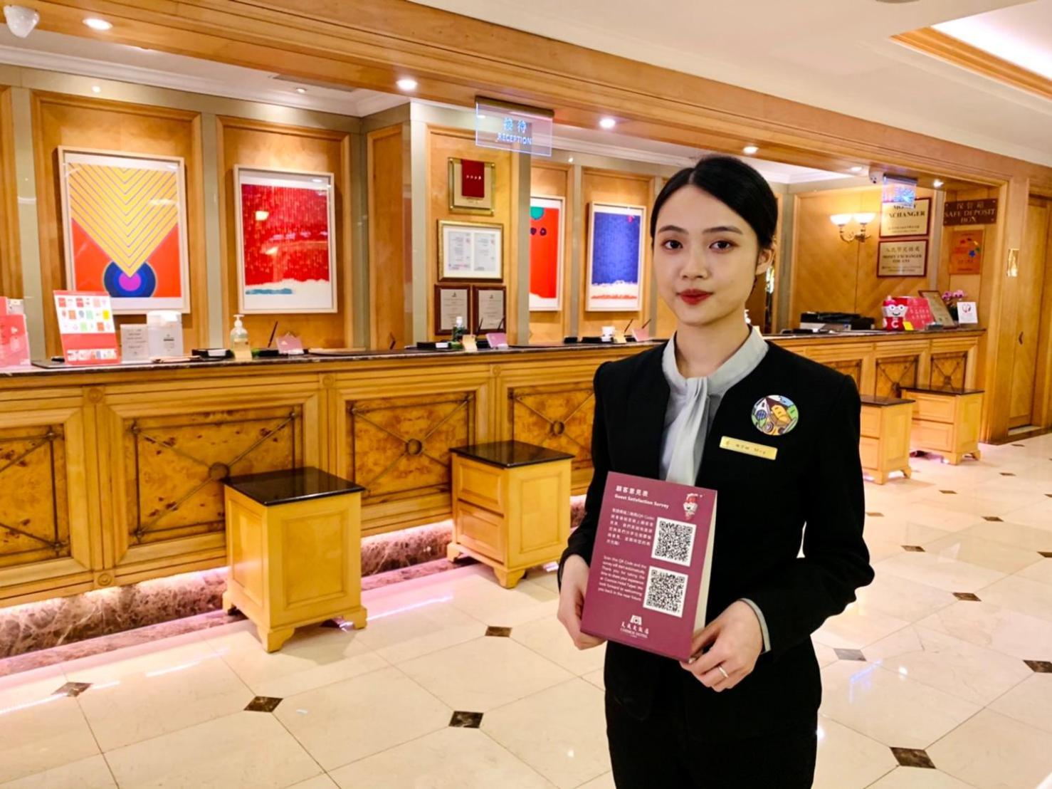 Cosmos Hotel Taipéi Exterior foto A hotel receptionist in China